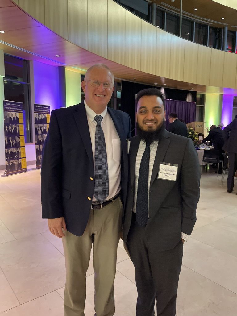 Muhammad with Dr. Ronald W. Niedrich